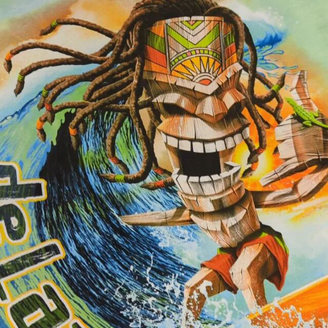 Detailed shot of a Jamaican and surf inspired digital print on a tshirt.